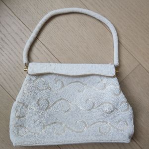 Beaded purse with spring closure